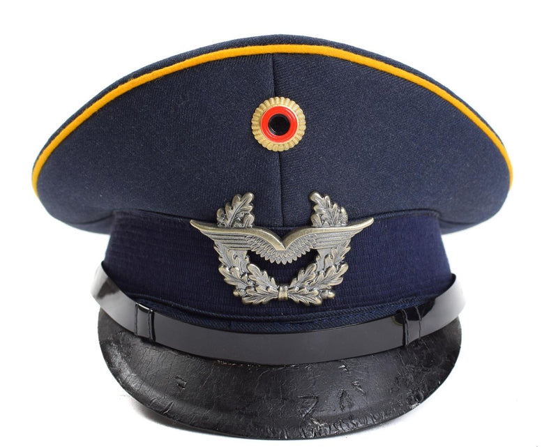 blue colored peaked cap with air force badge